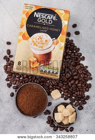 London, Uk - August 15, 2019: Pack Of Nescafe Gold Caramel Honey Latte With Coffee Beans And Sugar C