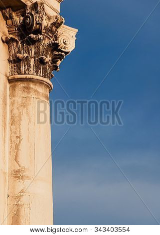 Classical architecture in Venice. Corinthian column and capital from Gesuati Church facade, erected in the 18th century (with copy space)