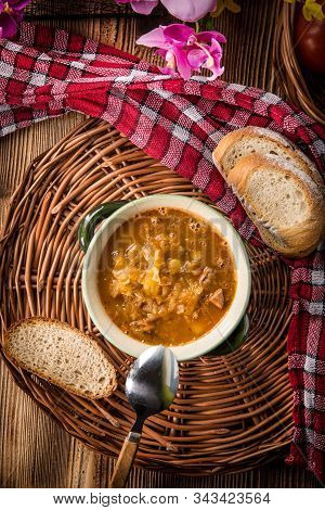 Traditional Russian Sour Cabbage Soup On Wicker Napkin. Top View.