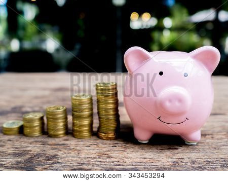 Pink Piggy Bank With 
Gold Coins Pile Growth Graph, Saving Money For Future Investment Plan And Reti