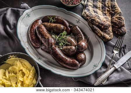 Roasted Sausages In Pan With Rosemary. Traditional European Food Bratwurst Jaternice Or Jitrnice.