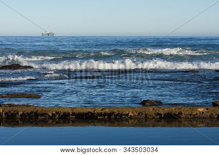 Seashore Tidal Pool And Rocks With Offshore Platform, Mossel Bay, South Africa