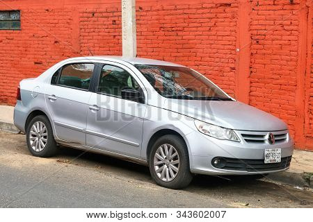 Oaxaca, Mexico - May 25, 2017: Grey Sedan Car Volkswagen Voyage In The City Street.