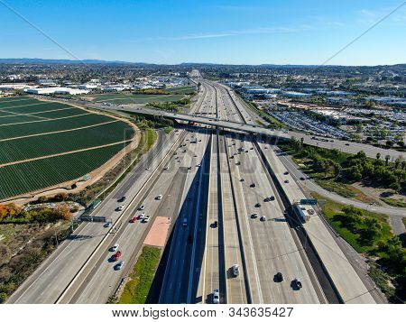 Aerial View Of Highway Transportation With Small Traffic, Highway Interchange And Junction, San Dieg
