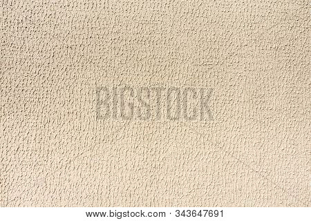 Background Texture Made Of Yellowish Abstract Ornament Of Sheetrock.horizontal Image