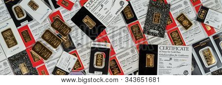Kyiv, Ukraine - November 2, 2018. A Lot Of Small Minted Gold Bars Minted Bars Of Gold Various Weight