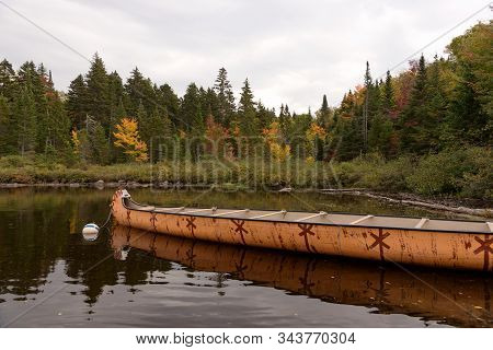 Canadian Rabaska Canoe On The Wapizagonke Lake. Mauricie National Park. Quebec. Canada