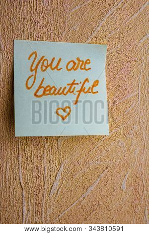 Text You Are Beautiful On Post It. Writing On Colorful Sticky Note. Bucharest, Romania, 2020.