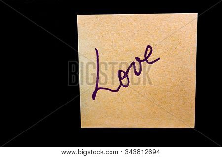 Text Love On Post It, Isolated On Black Background. Writing On Sticky Note. Bucharest, Romania, 2020