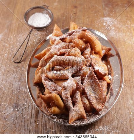 traditional french bugne- donut with sugar