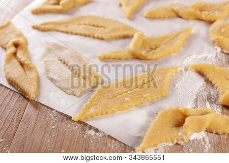 traditional french bugnes for carnival- raw dough and ingredient