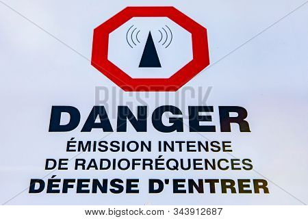 A Close Up View Of A French Sign In Quebec, Canada, Saying Danger, Intense Emission Of Radio Frequen