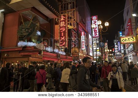 Osaka, Japan- 27 Nov, 2019: Beautiful Landscape View Of Japanese Store With Crowd Of Peoples And Tou