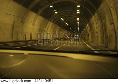 Underground Tunnel In The City With Cars Driving. City Infrastructure. Tunnel In Highway