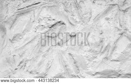 Texture Of A White Decorative Stucco Wall With A Wavy Structure As A Background