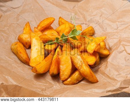 Tatsy Potato Slices In Rustic Style On Craft Paper