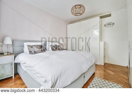 Cozy Bedroom With The Softest Bed Covered With A Soft Fluffy Bedspread