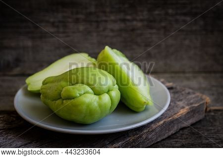 Fresh Green Prickly Pumpkin, Chayote On Wooden Background, (sechium Edulis)