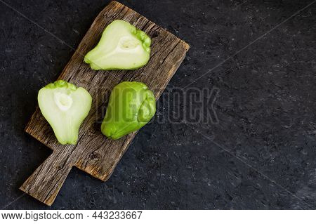 Fresh Green Prickly Pumpkin, Chayote On Wooden Background, (sechium Edulis)