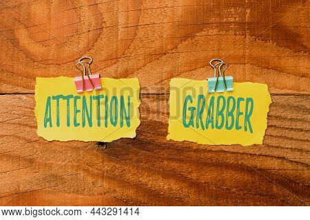 Text Sign Showing Attention Grabber. Business Approach Demanding Notice Mainly By Being Prominent Or