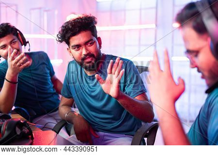Professional Gamers Angry On Teammate Due To Lost In Online Video Game Playing Compitation On Comput