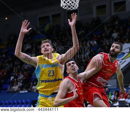 Kyiv, Ukraine - November 29, 2021: Artem Pustovyi Of Ukraine (l) Fights For A Ball With North Macedo