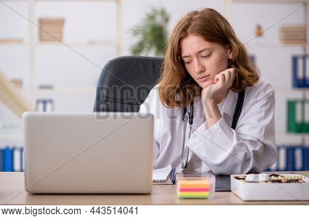 Young female doctor workiing in the clinic