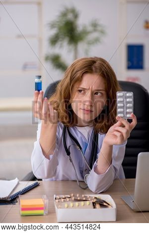Young female doctor workiing in the clinic