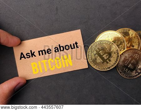 Bitcoins And Brown With Text Ask Me About Bitcoin On A Black Background.