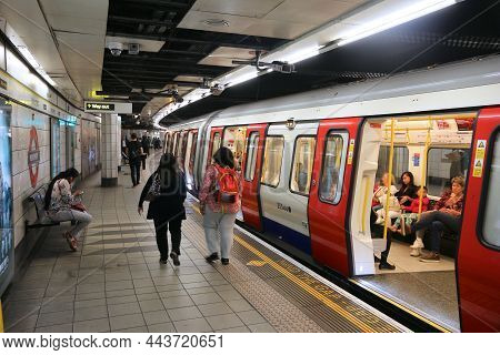 London, Uk - July 7, 2016: Passengers At London Underground Station Monument. London Underground Is 