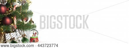 Part Of Dull Christmas Tree With Toys And Wooden Garland On White Background Banner. New Year. Selec