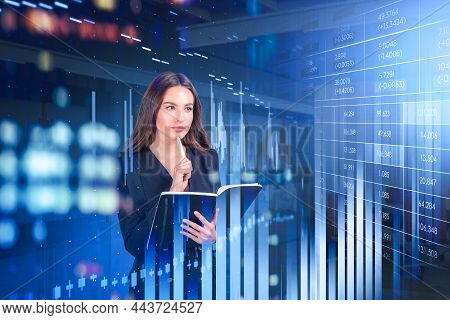 Boss Woman Thinking With Pen In Hand, Stock Market Hologram And Candlesticks. Business Graphs And Ba