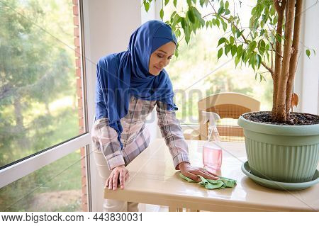 Smiling Delightful Gorgeous Beautiful Young Arabic Muslim Woman With Covered Head In Blue Hijab Wipi