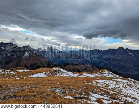 Beautiful Autumn Hike In The Beautiful Swiss Mountains Panorama Picture With The First Snow.mountain