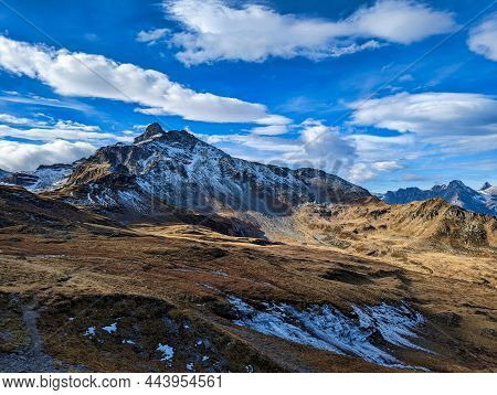 Beautiful Autumn Hike In The Beautiful Swiss Mountains Panorama Picture With The First Snow.mountain