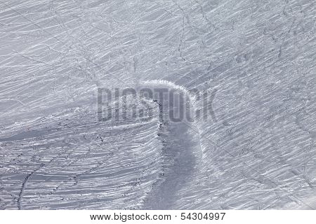 Off-piste Slope And Snowy Road With Trace From Ski And Snowboards