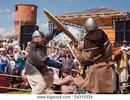 Medieval Fight At A Historical Reenactment Festival Held In Abalak, Siberia. Russia
