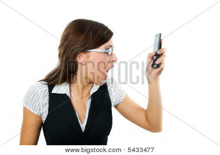 Angry Businesswoman Shouting To Mobile