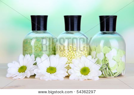 Aromatherapy minerals - colorful bath salt on light background