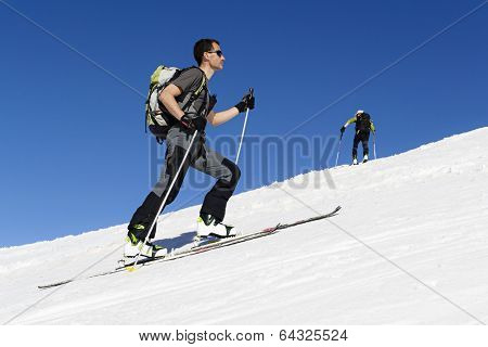 Skier ascending to the top
