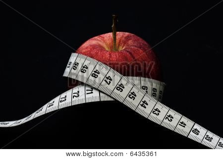 Red apple With Measuring Tape