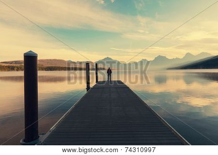 Man on summer lake