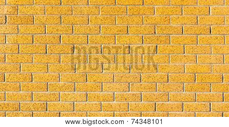 The Yellow Brick Wall Use As Background With Black Vignette.