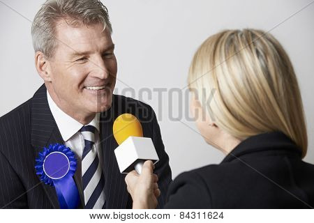 Politician Being Interviewed By Journalist During Election