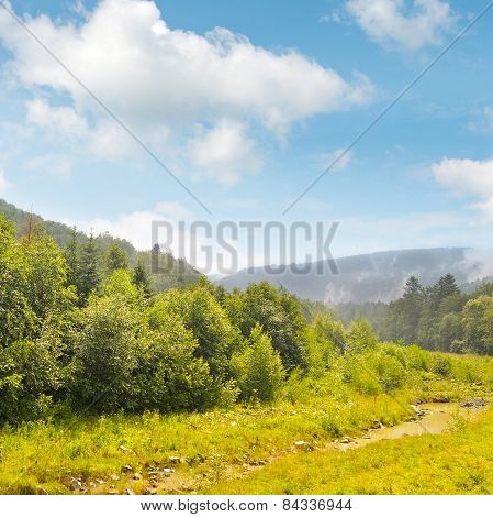Picturesque Mountain Valley And Creek