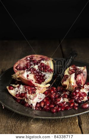 Moody Natural Lighting Images Of Fresh Juicy Pomegranate With Vintage Retro Style
