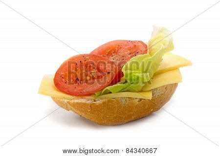 Bread Roll With Cheese, Salad And Tomatoes Isolated On A White
