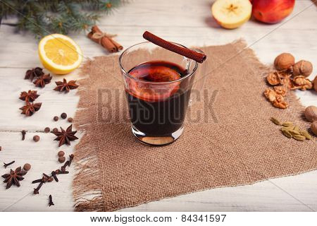 Mulled Wine, Punch And Spices For Glintwine On Wooden Background