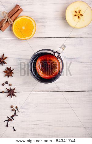 Mulled Wine, Punch And Spices For Glintwine On Wooden Background