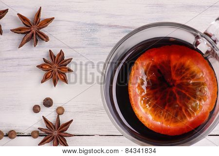 Mulled Wine, Punch And Spices For Glintwine On Wooden Background